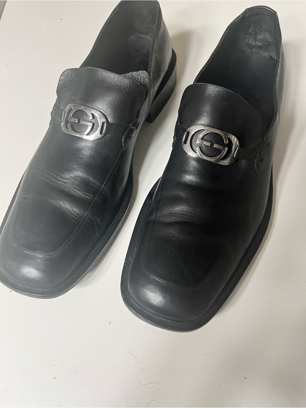 Gucci Black Leather Men's Slip-On Loafers with Silver Hardware